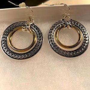 Earrings dangle silver and gold-toned fashion pierced earrings. NWOT never worn
